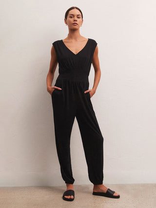 black one piece summer jumpsuit with v-neck keyhole details and smocked waist