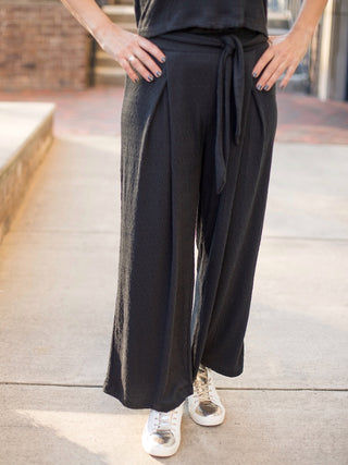 wear these super soft black pants in comfort fabric with a tie waist for chic street style fashion in every season