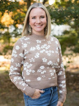 a pale brown sweater with white flower pattern and a mock turtleneck for feminine fall and winter fashion