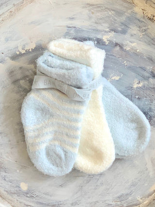 ultra soft newborn socks in delicate colors of blue pink and white
