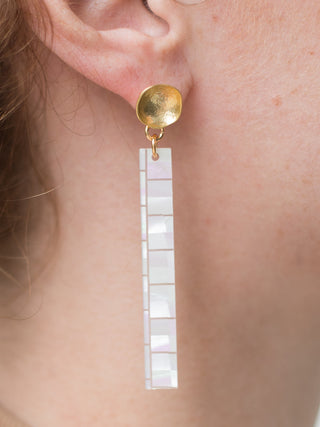 lightweight dangle earrings with a hammered round 24k gold plated post and iridescent white acrylic bar with geometric design