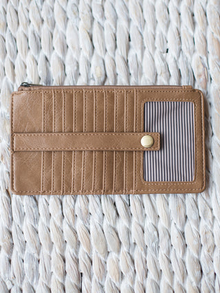 tan vegan leather wallet with cardholder exterior card pockets and zipper closure