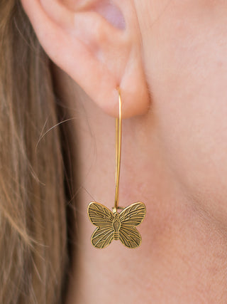 large gold monarch butterfly drop dangle earrings made of antique gold plated over brass