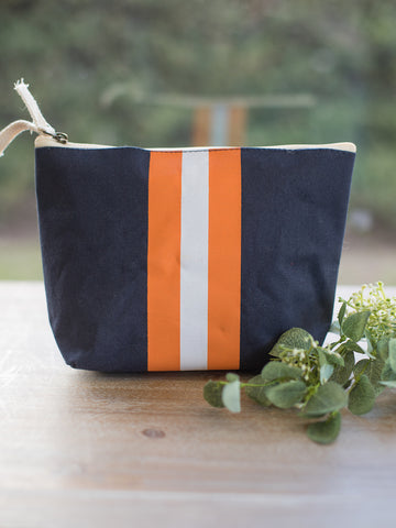 an adorable blue white and orange cosmetic bag with a zipper closure