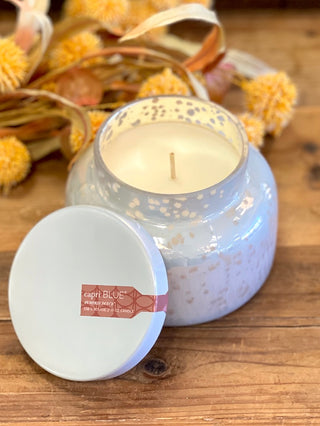 a pumpkin dolce scented candle in white speckled mercury perfect for halloween and thanksgiving fall decor gifts