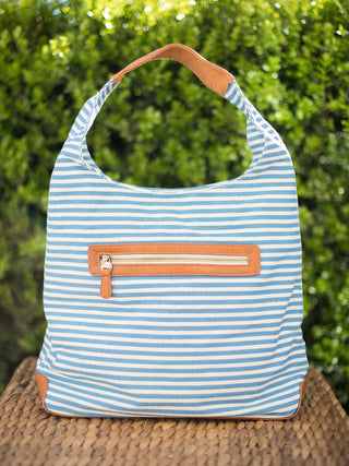 blue and white striped canvas bag in hobo silhouette with zip pocket and and removable inner bag