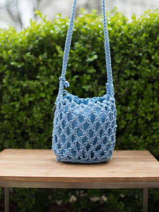 boho chic hand woven macrame open knit small crossbody blue bag with drawstring closure