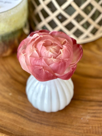 realistic decorative flower diffuser blooms a lovely pink color and fills your home with sweet fragrance