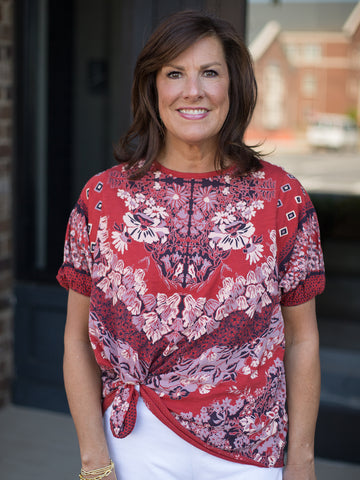 this red boho floral print tee with drop sleeves and raw seams