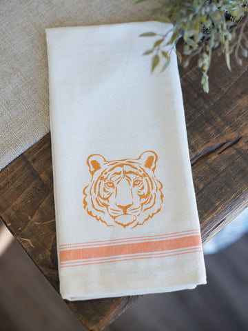 an off white hand towel featuring an orange tiger face for your kitchen or powder room