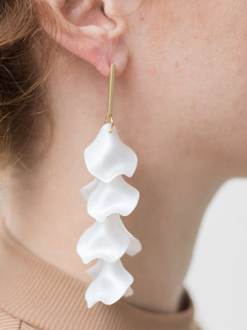 long dangle earrings with white cascading petals that drop from gold bar post are flirty and elegant for wedding