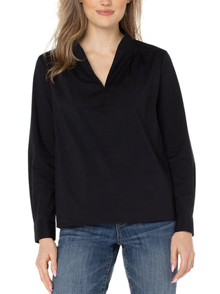 a black stretch long sleeve blouse with a v neckline and pleat details perfect for day to night fall fashion