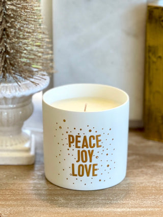 decorate your home with this fig scented candle in white porcelain that reads peace joy love or give as a hostess gift