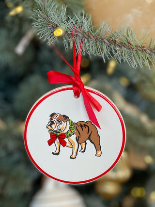 this white christmas ornament with red trim with a painted uga bulldog is the perfect holiday gift for dawgs fans and alumni