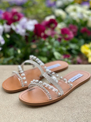 sparkly slip on flat vegan leather sandals with clear vinyl straps and rhinestone silver detail round open toe for wedding