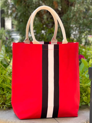 a red white and black tote with rope carrying straps perfect for uga fans and alumni