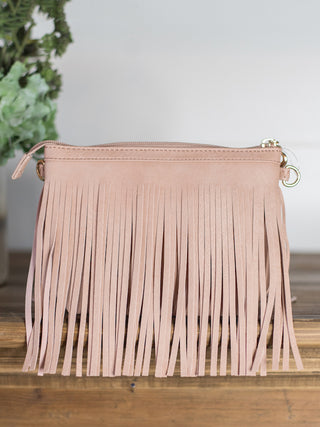 western style rose pink beige vegan leather clutch purse handbag with fringe and comes with crossbody adjustable strap