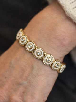 gold tone elastic bracelet with white milgrain beads is a great solo act or the perfect new bracelet to add to your stack